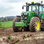 a modern high-horsepower tractor working a British agricultural field